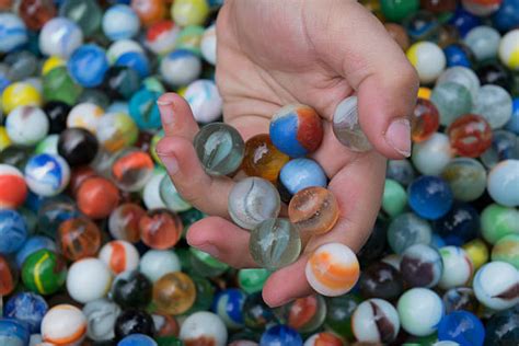 Children Playing Marbles Stock Photos Pictures And Royalty Free Images