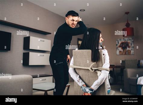 Man Tied To Chair High Resolution Stock Photography And Images Alamy