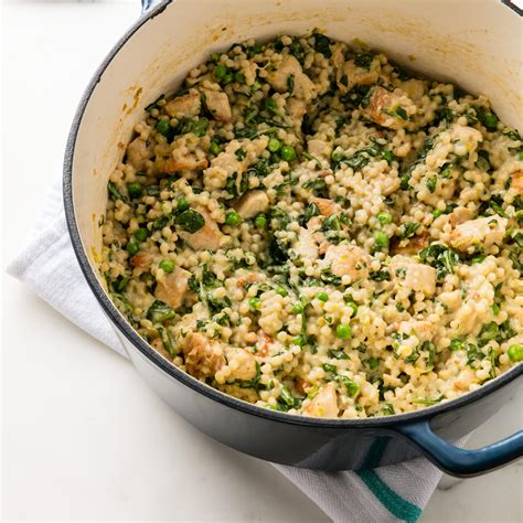 Who's got time or strength for that?rather than adding rather than adding liquid to the dry couscous and mixing it, this recipe just pours the liquid over the top and leaves it in a warm oven. Couscous Risotto with Chicken and Spinach | Cook's Country ...