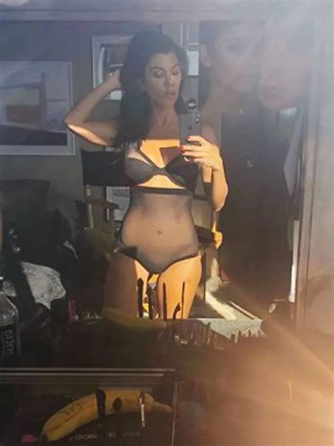 Kourtney Kardashian Flashes Cleavage In Sheer Underwear As She Teases Raunchy Backstage Shots