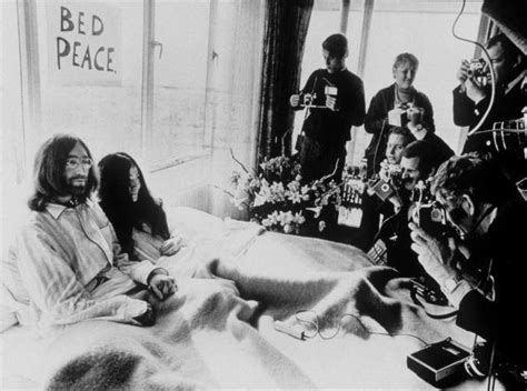 On This Day In Photos Yoko Ono Saves John Lennon From The