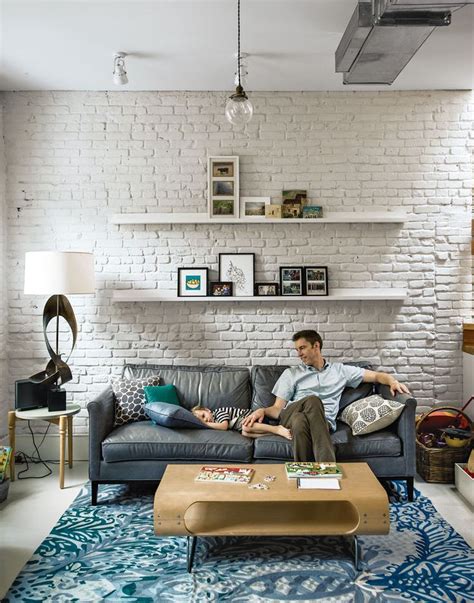 Modern Living Room With Exposed Painted Brick Walls Brick Living Room