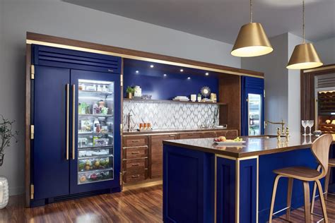 This integrated fridge and freezer is designed to go into a cabinet and be fitted with the same types of doors as the rest of your kitchen for a seamless look. Glass door refrigerator with range of finish options | For ...