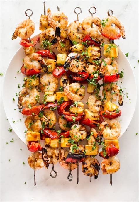 Lay the skewers in the butter mixture in the shallow dish and coat both sides with the seasoning. Pineapple Shrimp Skewers Recipe • Salt & Lavender