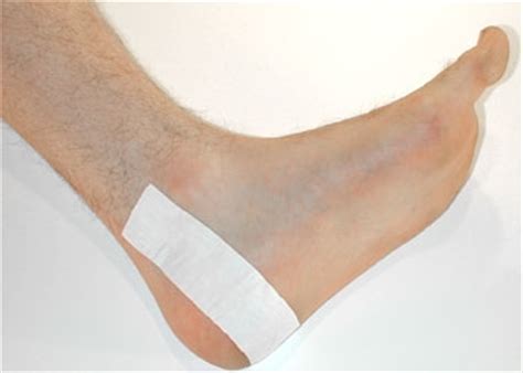 How to wrap a sprained foot with athletic tape. Video: How to Tape a Sprained Ankle | eHow