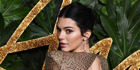 kendall jenner just wore a stunning gold gown and it s very nsfw