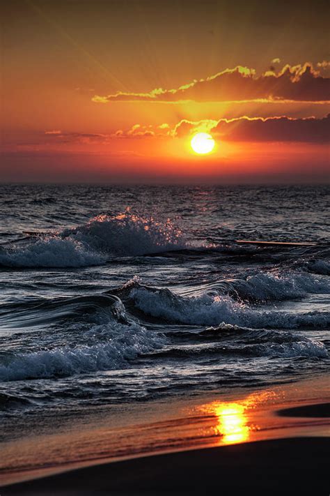 It is beautiful and the dunes along it make it even more numerous resort towns near lake michigan but only a few such as st joe and south haven are. Vertical Photograph Of A Lake Michigan Sunset Photograph ...