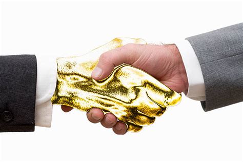 Golden Handshake Stock Photos Pictures And Royalty Free Images Istock