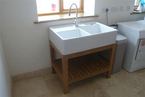 Belfast sinks are not a new phenomenon. Contemporary excellence applied to a utility room, kitchen ...