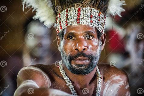 Portrait Of A Man From The Tribe Of Asmat People On Asmat Welcoming