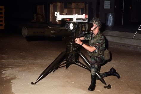 A Gunner Kneels In Position Under A Tow Tube Launched Optically