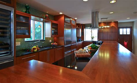 Both have oodles of water traffic, so that makes sense. Custom Cherry Wood Countertop in Florida with Durata® Finish