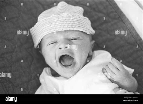 Newborn Baby Boy Yawning Stock Photo Alamy