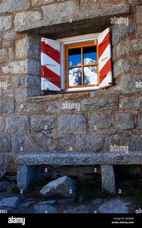 Switzerland Valais Val Ferret Mountains Reflected In The Windows Of
