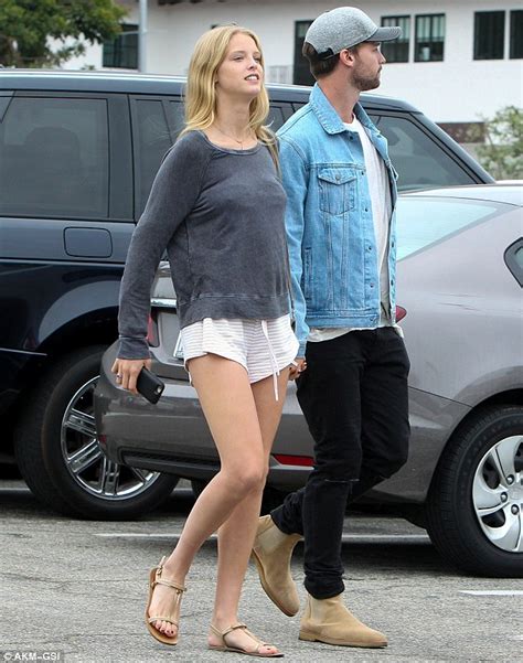patrick schwarzenegger piles on the pda with leggy girlfriend abby champion daily mail online