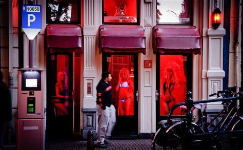 amsterdam red light district ladies by rudmerhk via flickr amsterdamredlightdistrict red