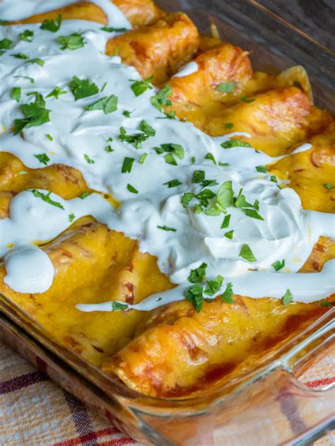 This enchilada casserole recipe is an excellent choice for a busy day meal. Easy Cheesy Ground Beef Enchiladas - 12 Tomatoes