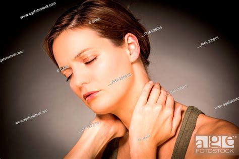 Woman Suffering From Neck Pain Stock Photo Picture And Rights Managed