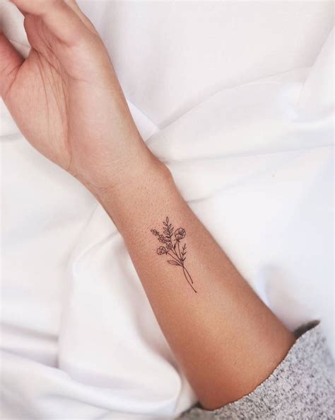 Fine Line Flower Bouquet Tattoo On The Wrist