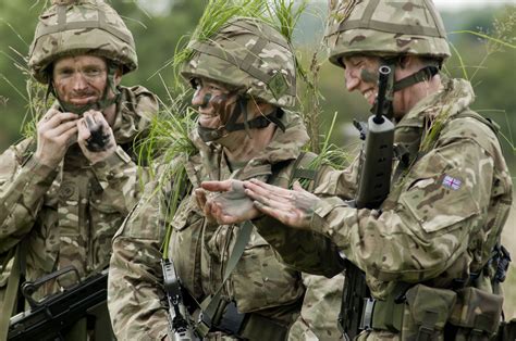British army recruits 30 nano 'bug' drones as battlefield spies. File:Army Reservists Applying Camouflage MOD 45156161.jpg ...
