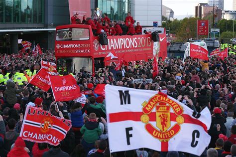 tens of thousands of fans are united in celebration manchester united manchester united fans