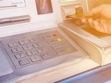Hand Inserting Atm Card Into Atm Bank Machine Stock Image Image Of