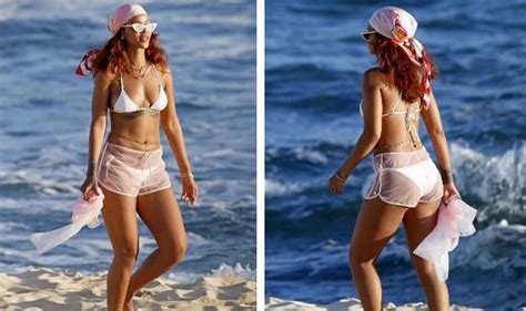 Rihanna Flaunts Toned Body In White Bikini As She Holidays In Hawaii