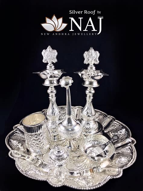 A Complete Traditional Pooja Set In Silver Available Soon In Various