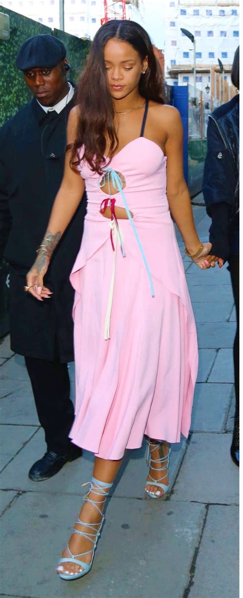 Rihanna Wearing A Pink Slip Dress Designed By Rosie Assoulin Dsquared2s Riri Sandals And