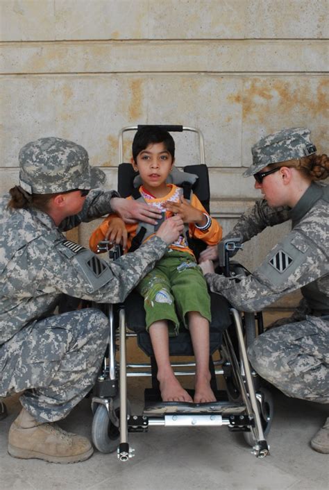 Vanguard Soldiers Help Disabled Iraqi Children Article The United