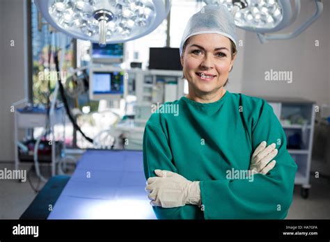 Portrait Of A Female Surgeon Standing In Operation Theater Stock Photo