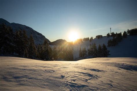 Beautiful Winter Mountain Landscape With Rising Sun Behind The Mountain