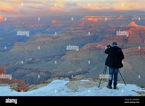 Photographer At The Grand Canyon At Sunrise In Winter From Hopi Point
