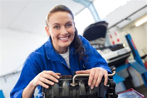Mechanic Working On An Engine Stock Image Image Of Female Looking