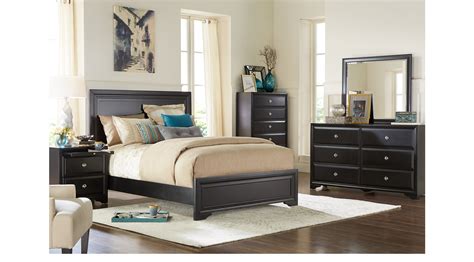 The furniture includes a queen size bed with. Belcourt Black 7 Pc King Panel Bedroom - Contemporary