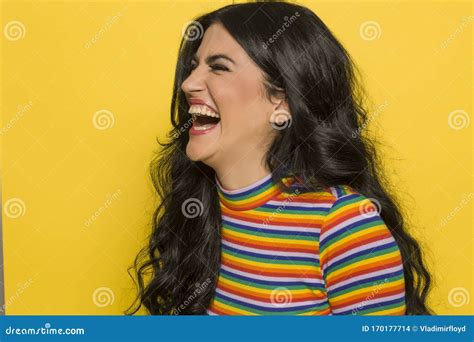 Attractive Laughing Brunette On Yellow Stock Photo Image Of Hair