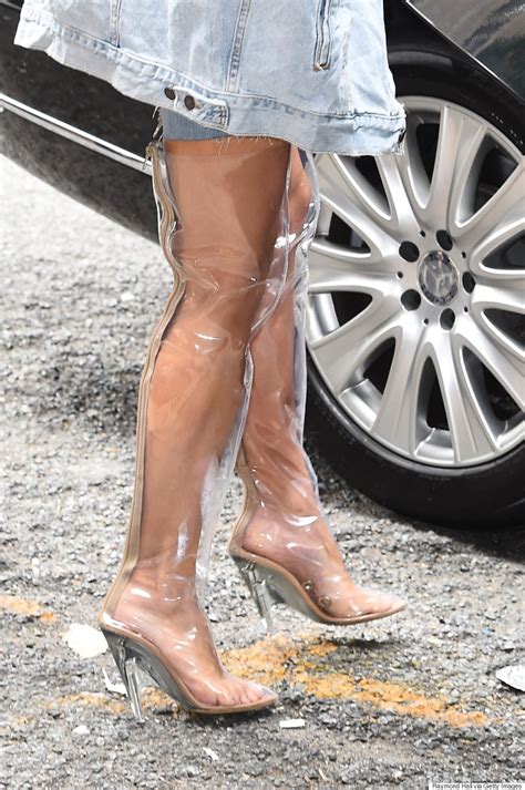 Kim Kardashians Clear Thigh High Boots Take Rainwear To The Next Level