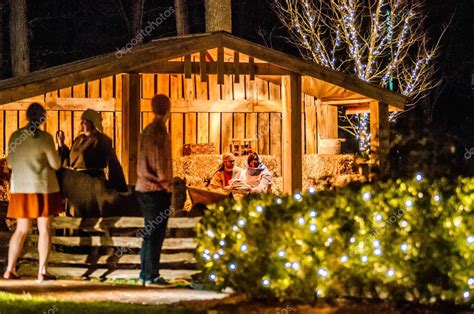 Visitors Viewing Live Nativity Play During Christmas Stock Editorial