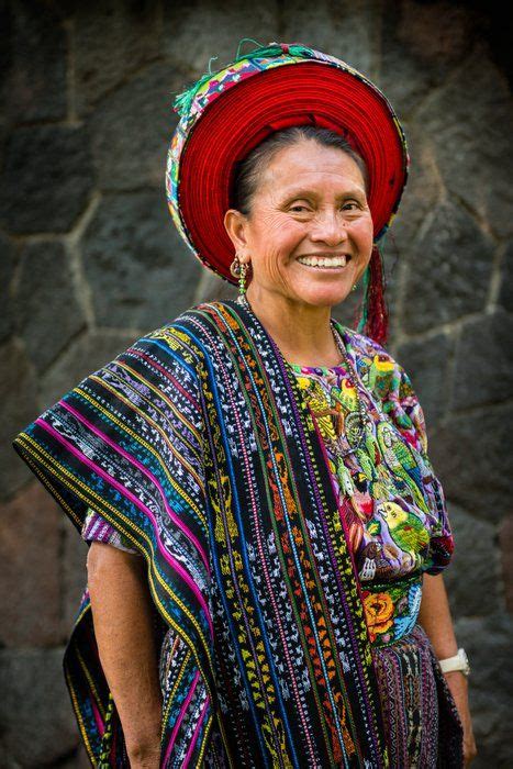 A Maya Woman Wears Traditional Dress Including Tocoyal Headdress