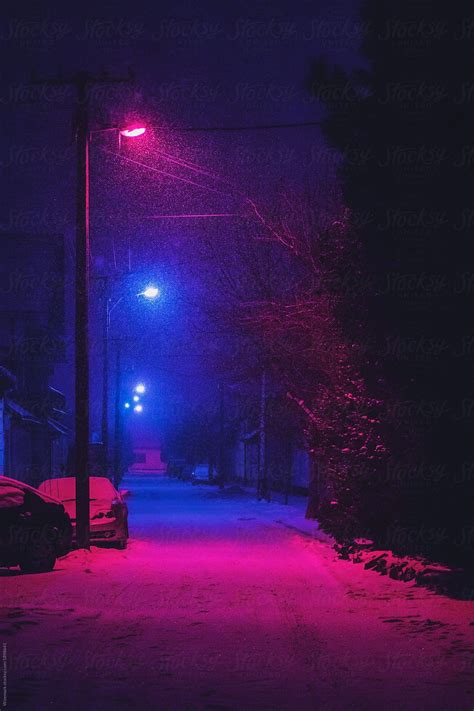 Street At Night Covered With Snow By Stocksy Contributor Wizemark