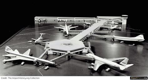 Several Model Airplanes Sitting On Top Of A Black And White Floor In