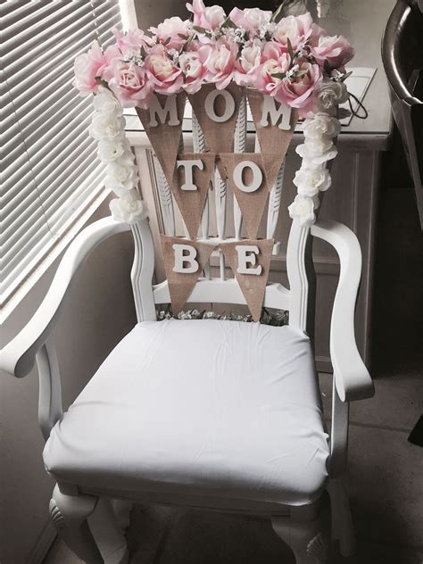 Cakes make quite a presentation when decorating! Baby shower chair idea. Flowers from Walmart , Wood ...