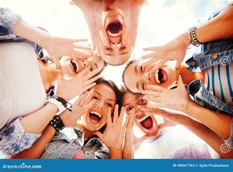 Group Of Teenagers Looking Down And Screaming Stock Image Image Of