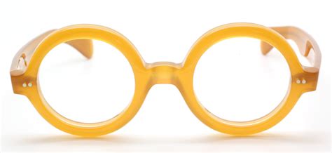 thick rimmed true round 180e style italian acetate eyewear by beuren big round in a honey