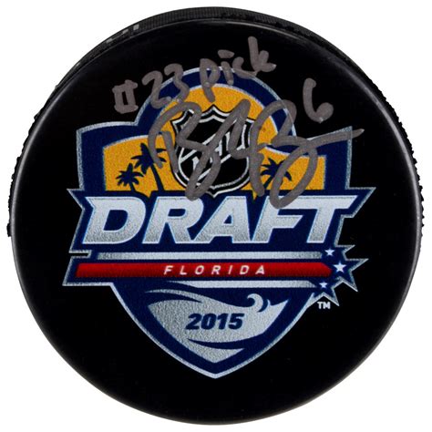 brock boeser vancouver canucks autographed 2015 nhl draft logo hockey puck with 23 pick