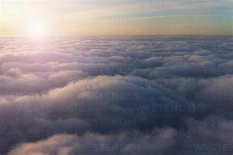 High Angle View Of Sky Above Clouds Stock Photo