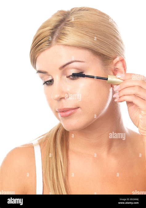 Young Woman Applying Mascara Model Released Stock Photo Alamy
