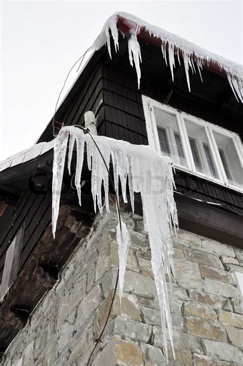 Dangerous Big Frozen Winter Icicles On The Roof Stock Image Colourbox