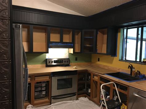 Is butcher block coming back in style. Work in progress black painted cabinets butcher block ...