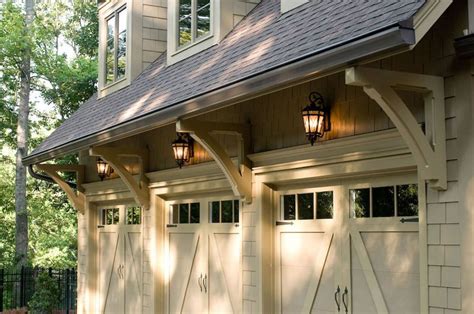Carriage Garage Doors With Glass Support Brackets Lanterns Above